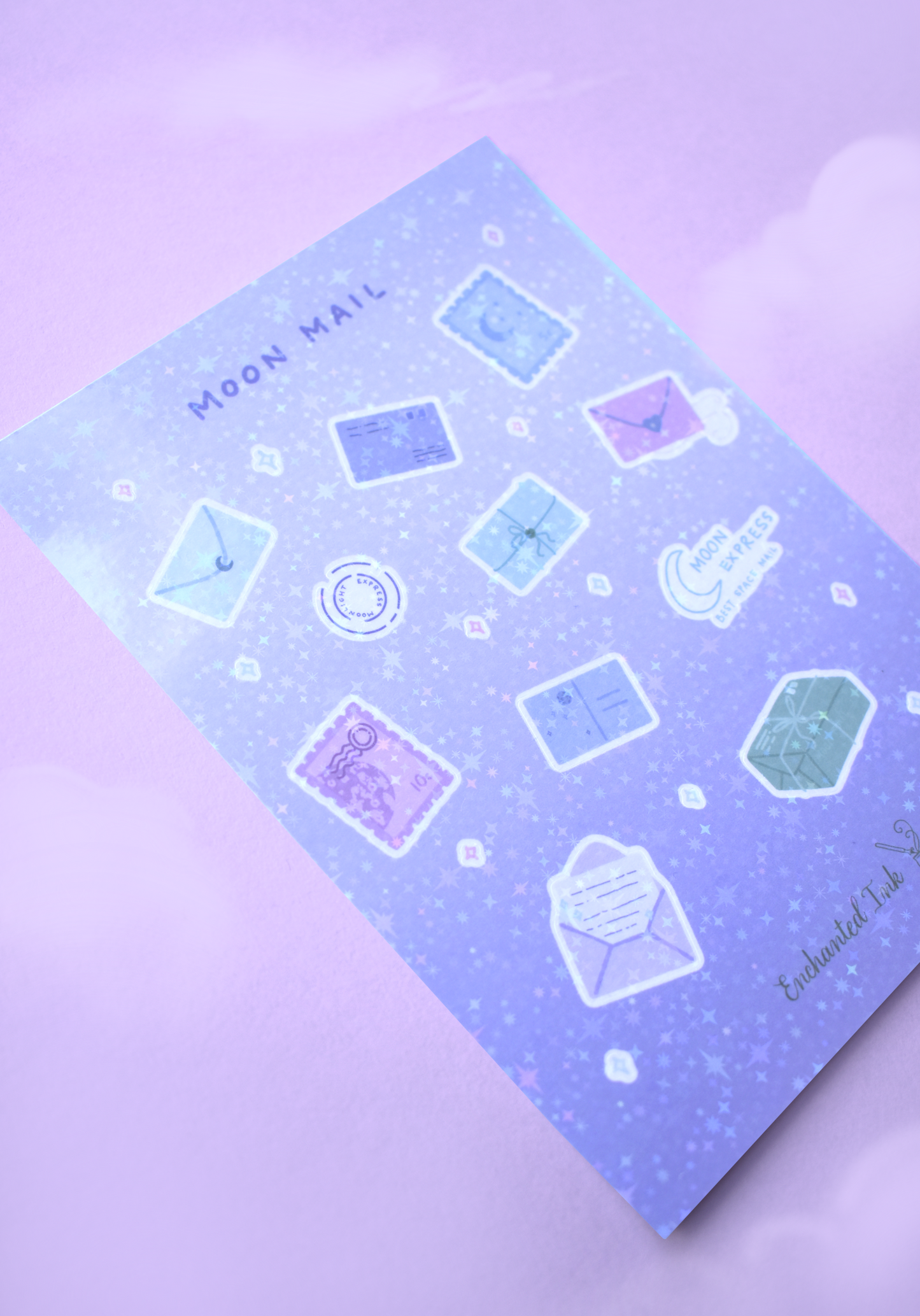Holographic sticker sheet with 'Moon Mail' design on a matching purple background