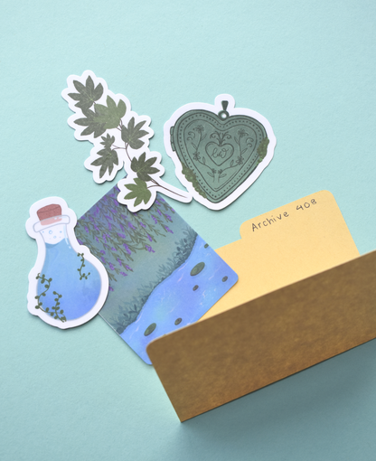 Set of decorative stickers with plants and a heart design on a light blue background