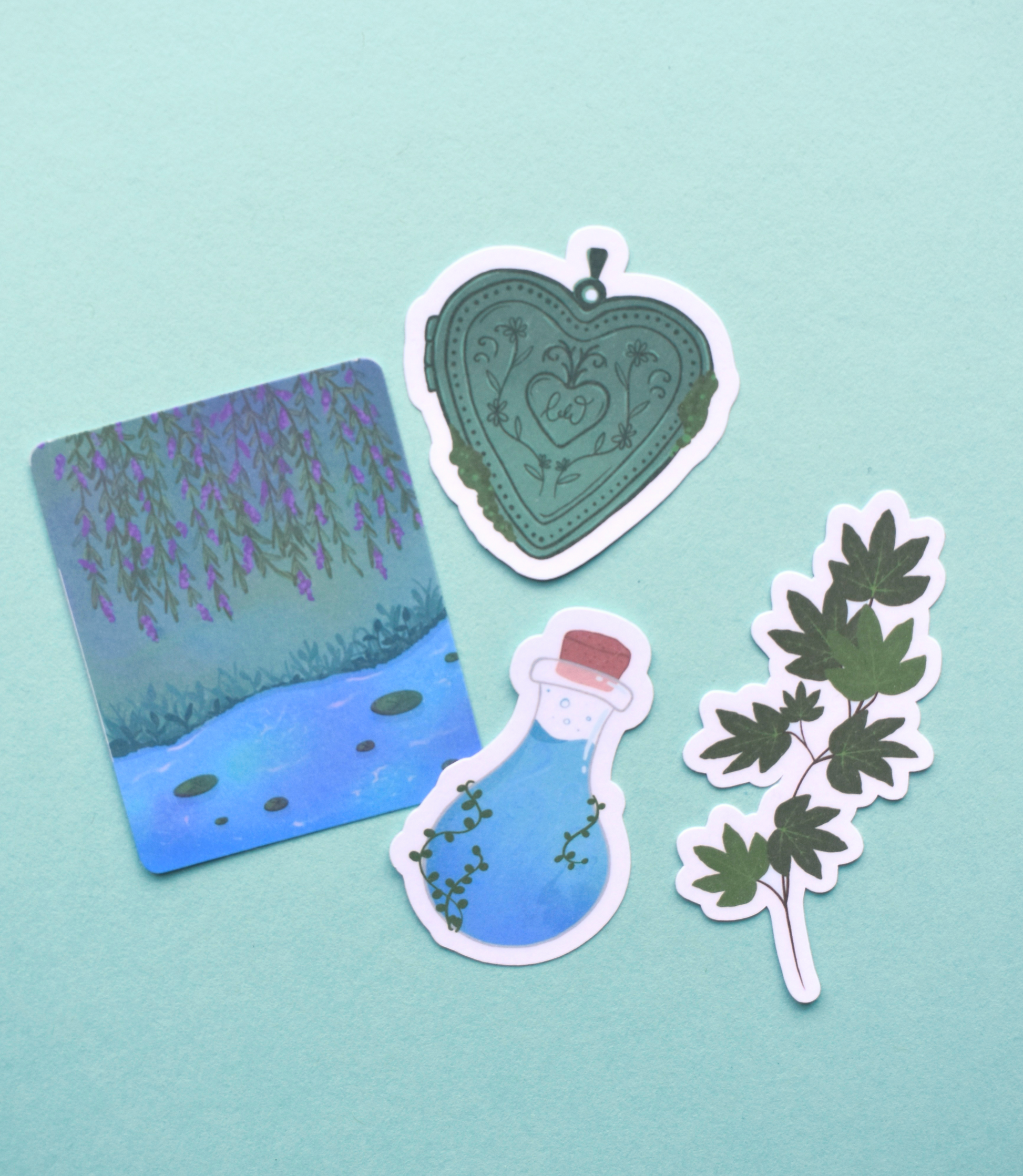 Set of four illustrated stickers on a light blue background