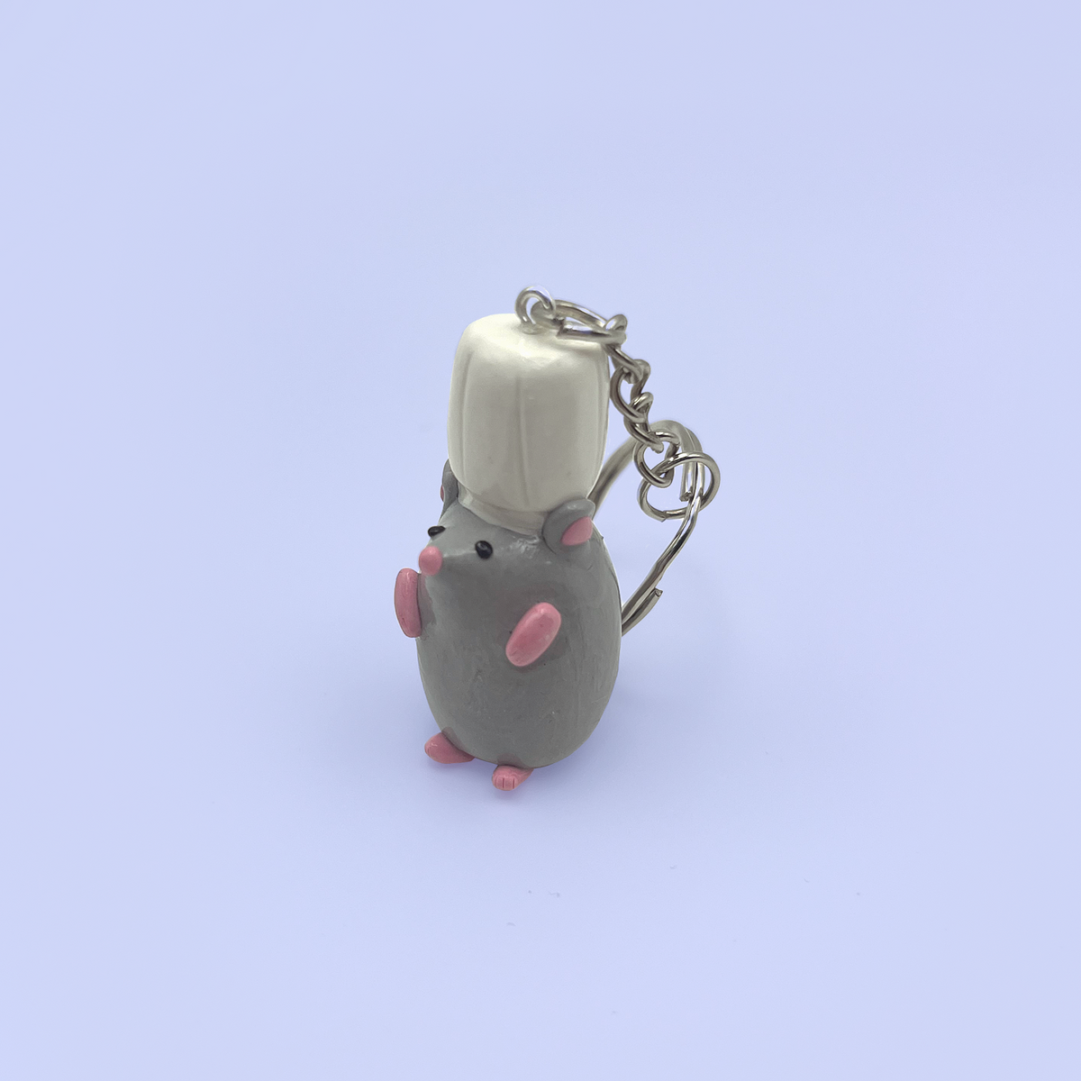 A cute rat keychain key ring made from polymer clay 