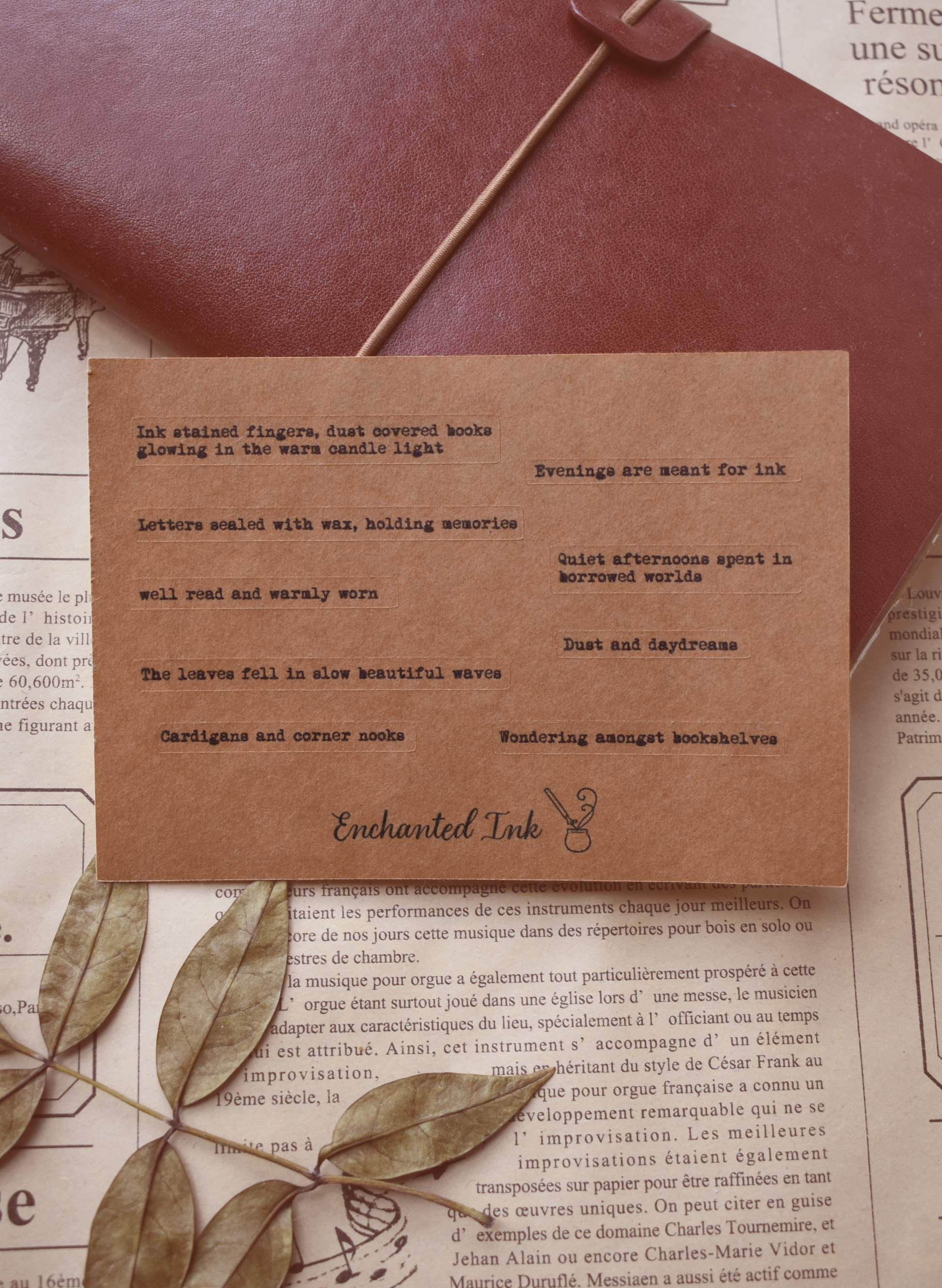 Detailed view of kiss-cut quote stickers in typewriter style on matte paper