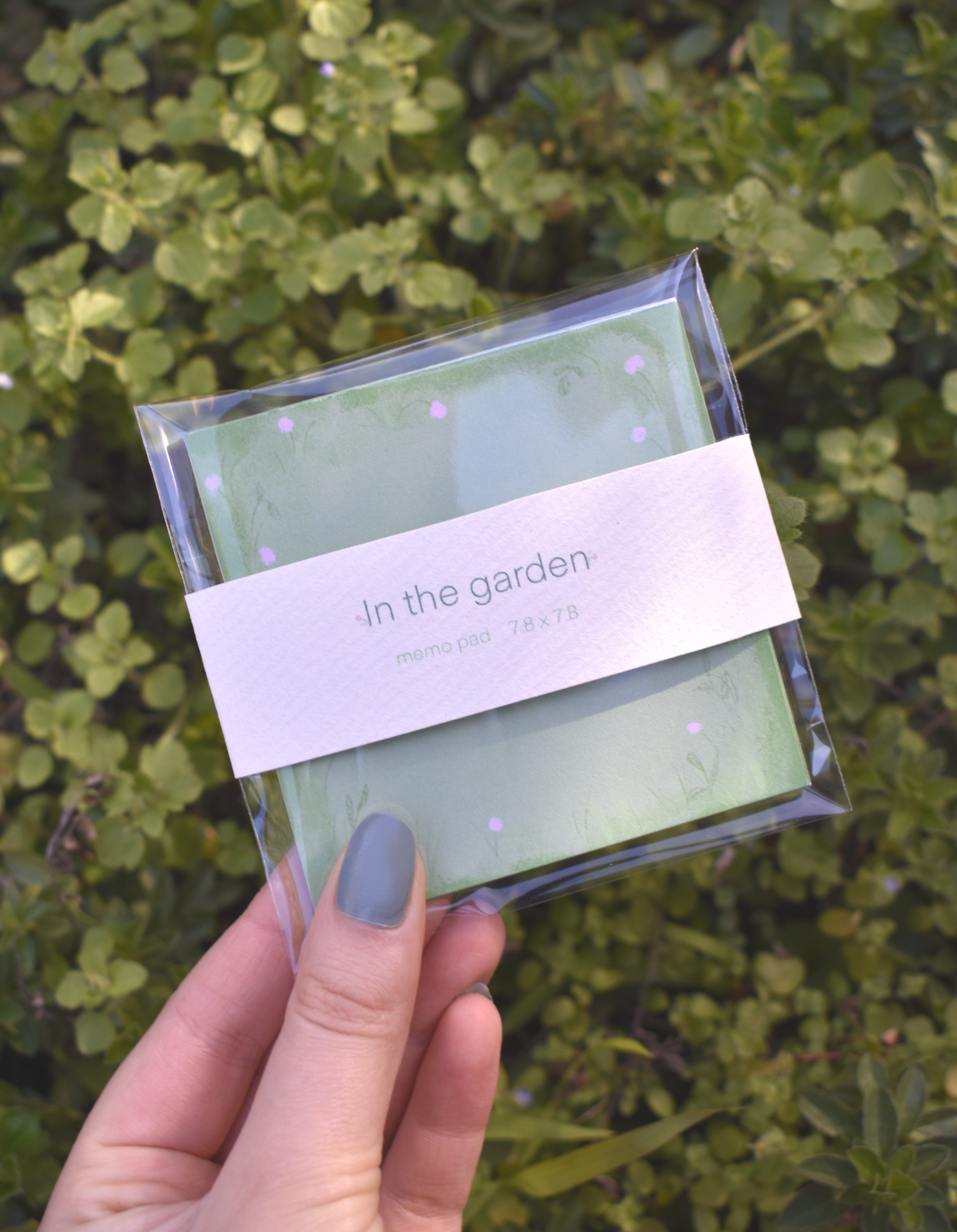Detailed floral border design on In the Garden memo pad