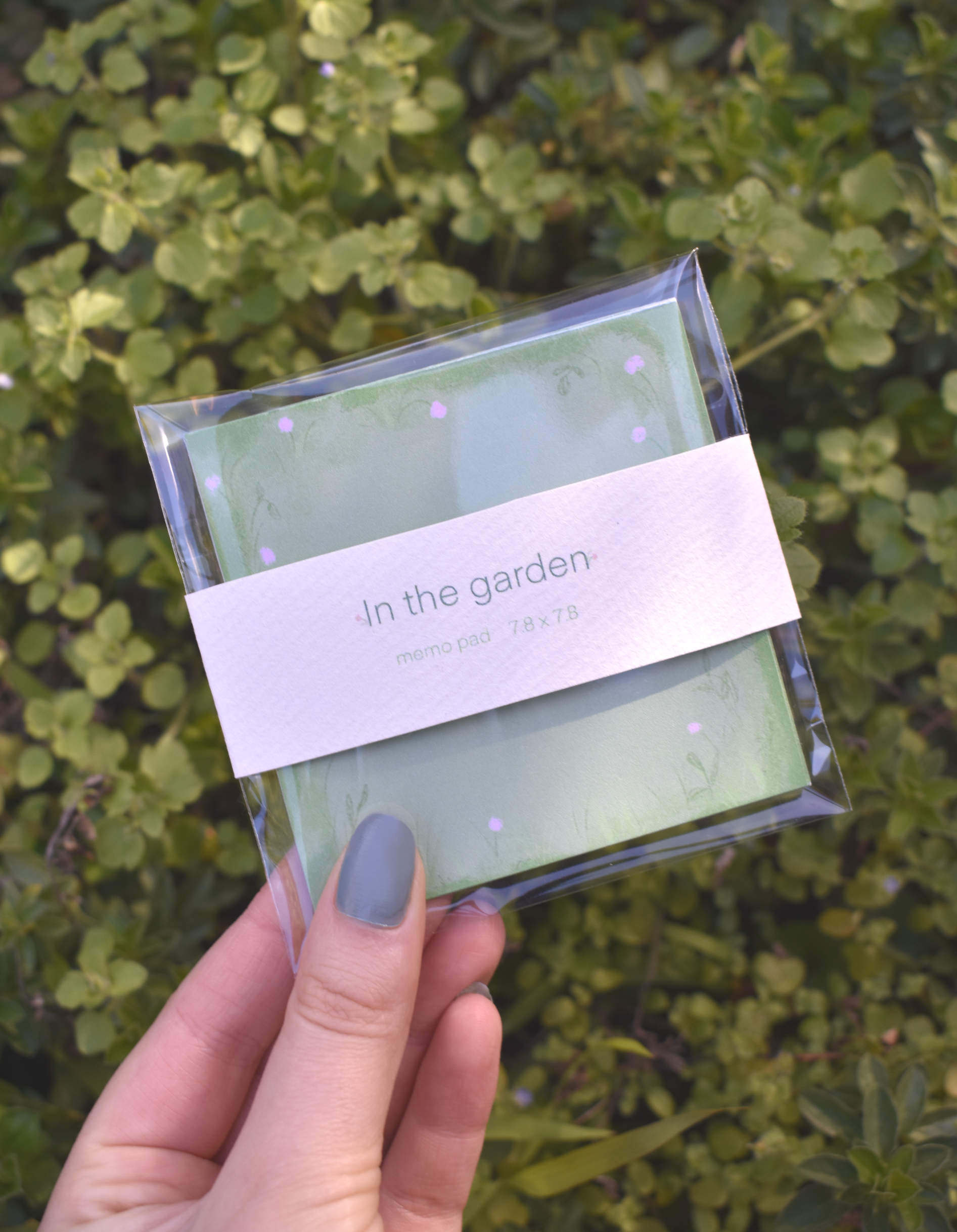 Detailed floral border design on In the Garden memo pad