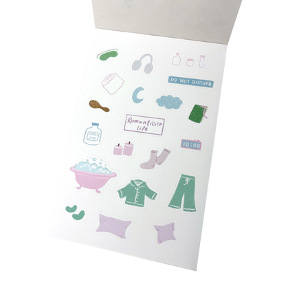 A sheet of cute, minimalist stickers featuring bath and bedroom items like a bathtub, pajamas, socks, headphones, and a 'DO NOT DISTURB' sign.