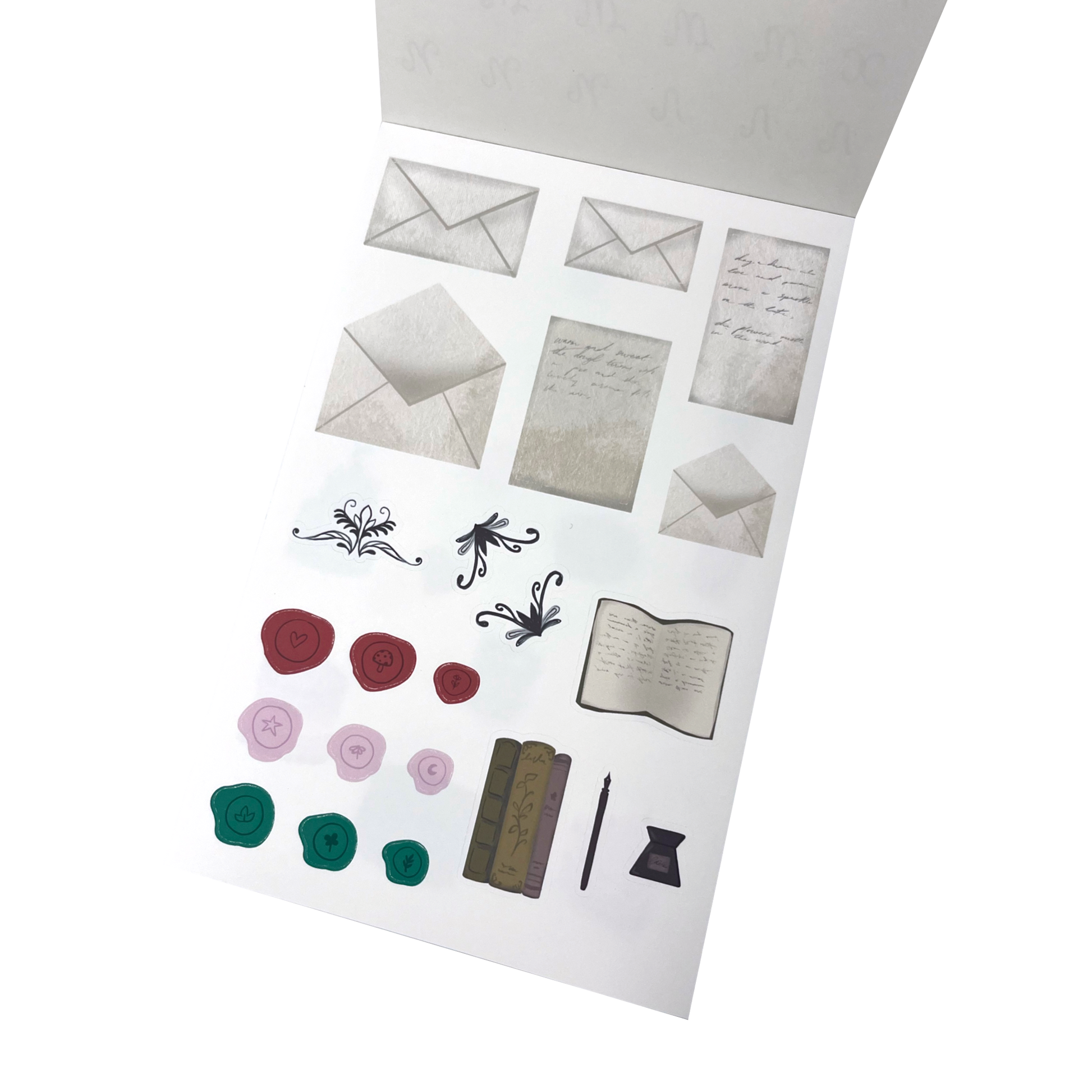 A sheet of decorative stationery stickers, including multiple envelopes, handwritten note cards, floral scroll designs, wax seals in red, pink, and green, an open book, a pen and ink.