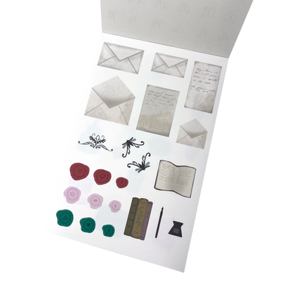 A sheet of decorative stationery stickers, including multiple envelopes, handwritten note cards, floral scroll designs, wax seals in red, pink, and green, an open book, a pen and ink.