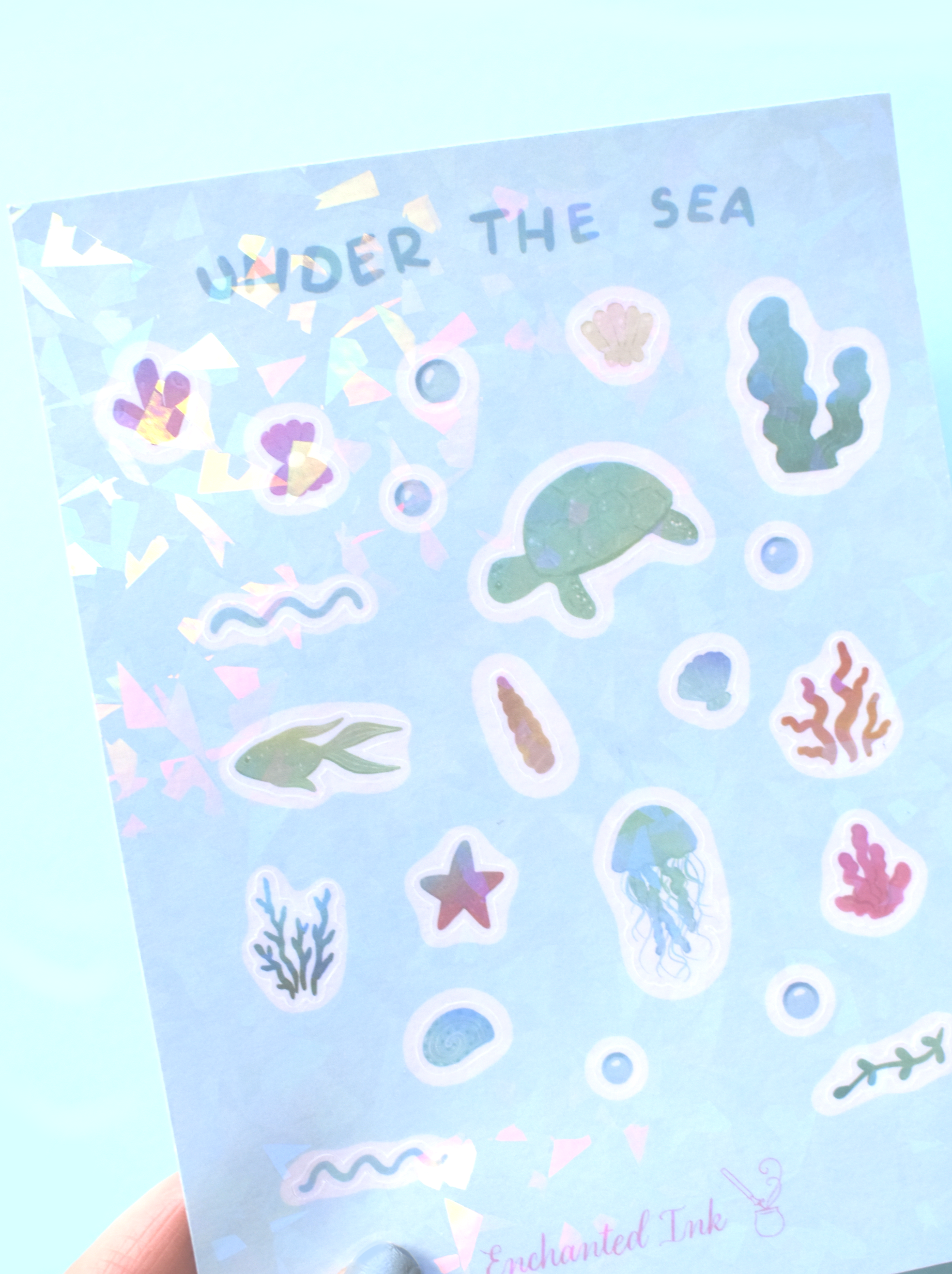 Sheet of 'Under the Sea' themed stickers with various marine life illustrations on a light blue background.