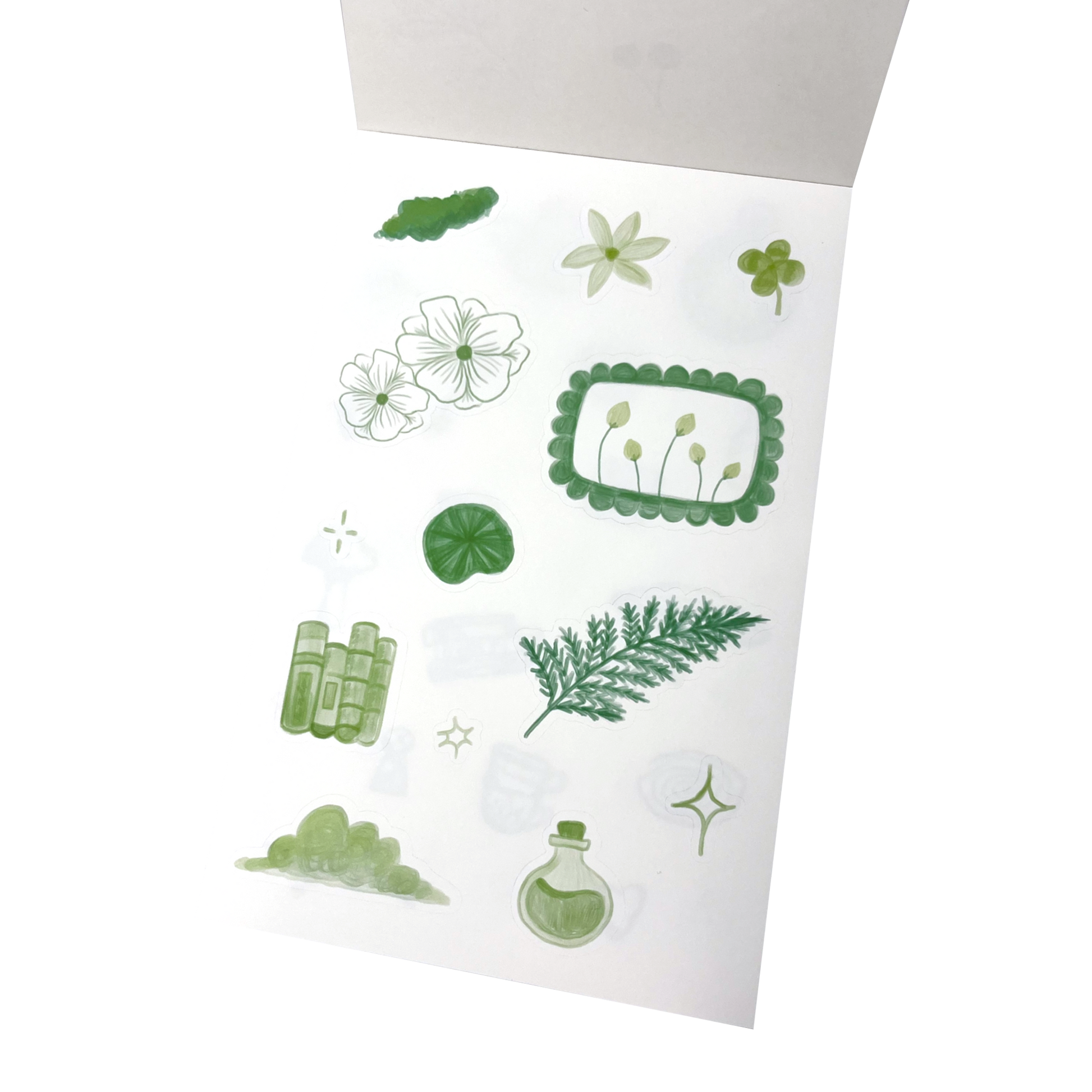 A sheet of botanical-themed stickers featuring green and white illustrations of flowers, leaves, a fern, a clover, a small potion bottle, and decorative frames.
