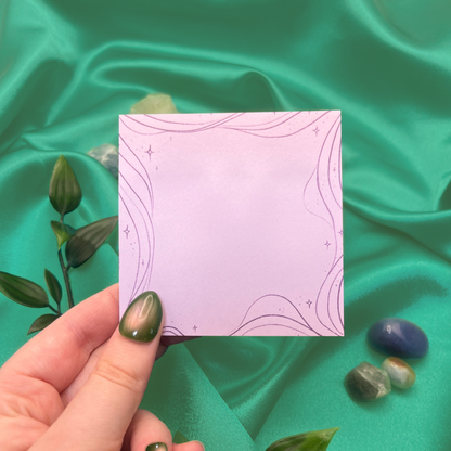 Sticky notes with a purple magic swirl design for witchy gifts 