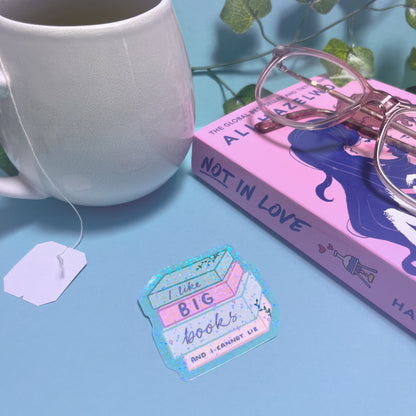 Holographic bookish sticker styled with books and cozy reading items