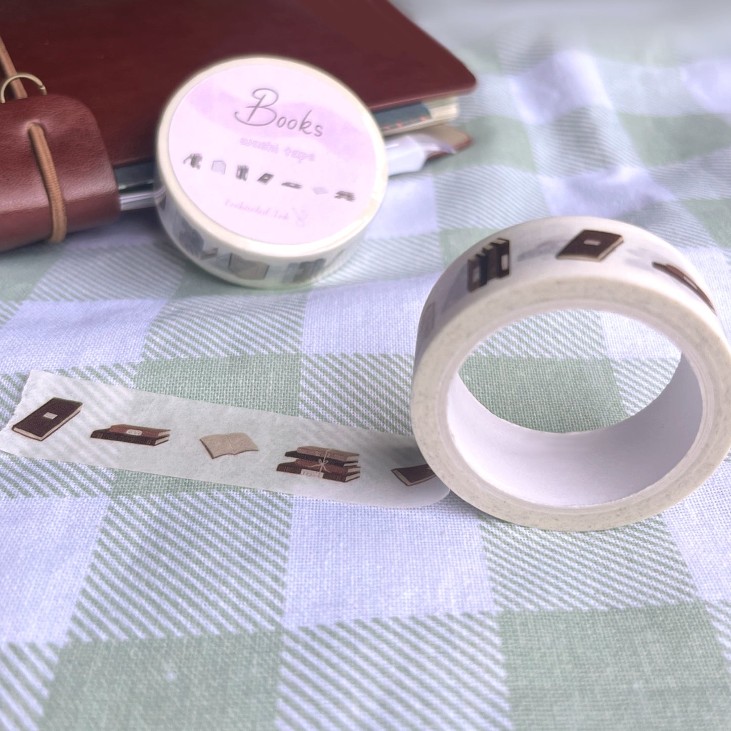 Close-up of vintage book themed washi tape with cozy literary designs