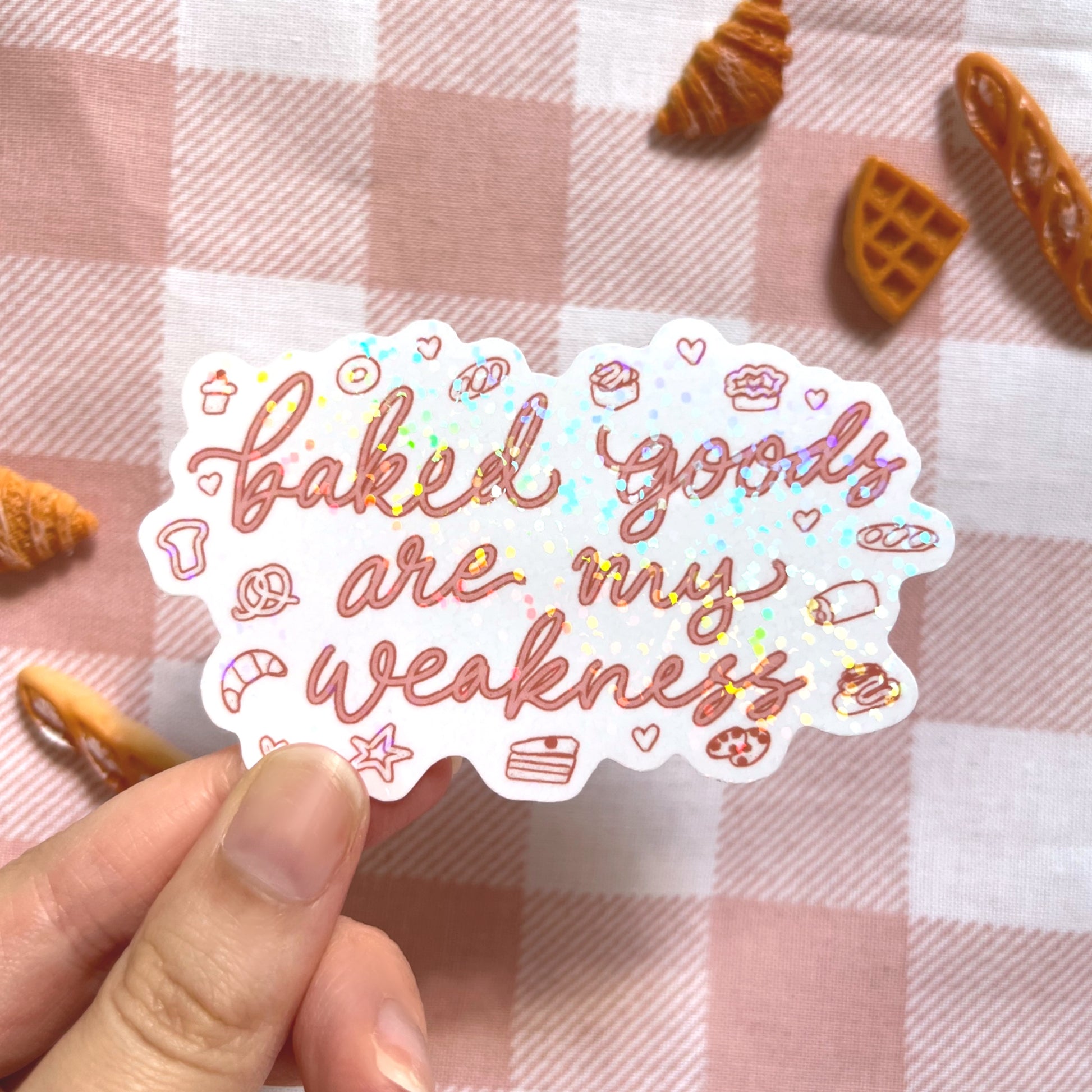 Close-up of holographic baked goods sticker with shimmer finish
