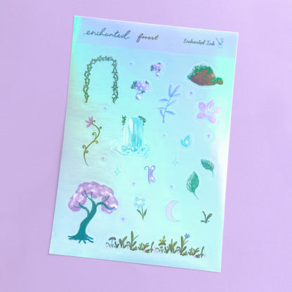 Enchanted forest holographic vinyl sticker sheet with whimsical woodland illustrations on blue background