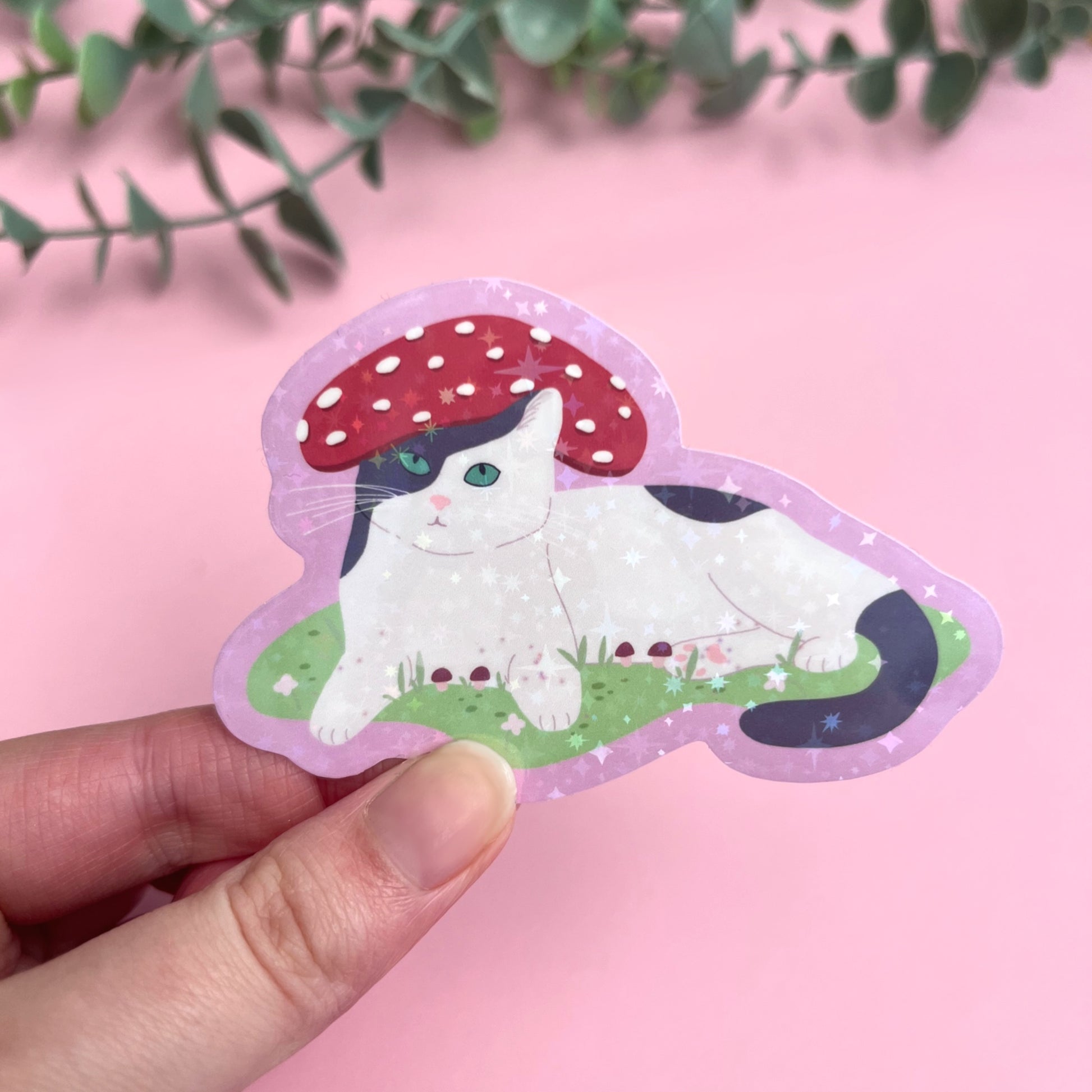 Whimsical holographic cat sticker with mushroom cap hat inspired by enchanted forests
