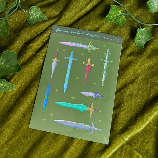 Fantasy swords and daggers glossy vinyl sticker sheet with colourful detailed blades on green background