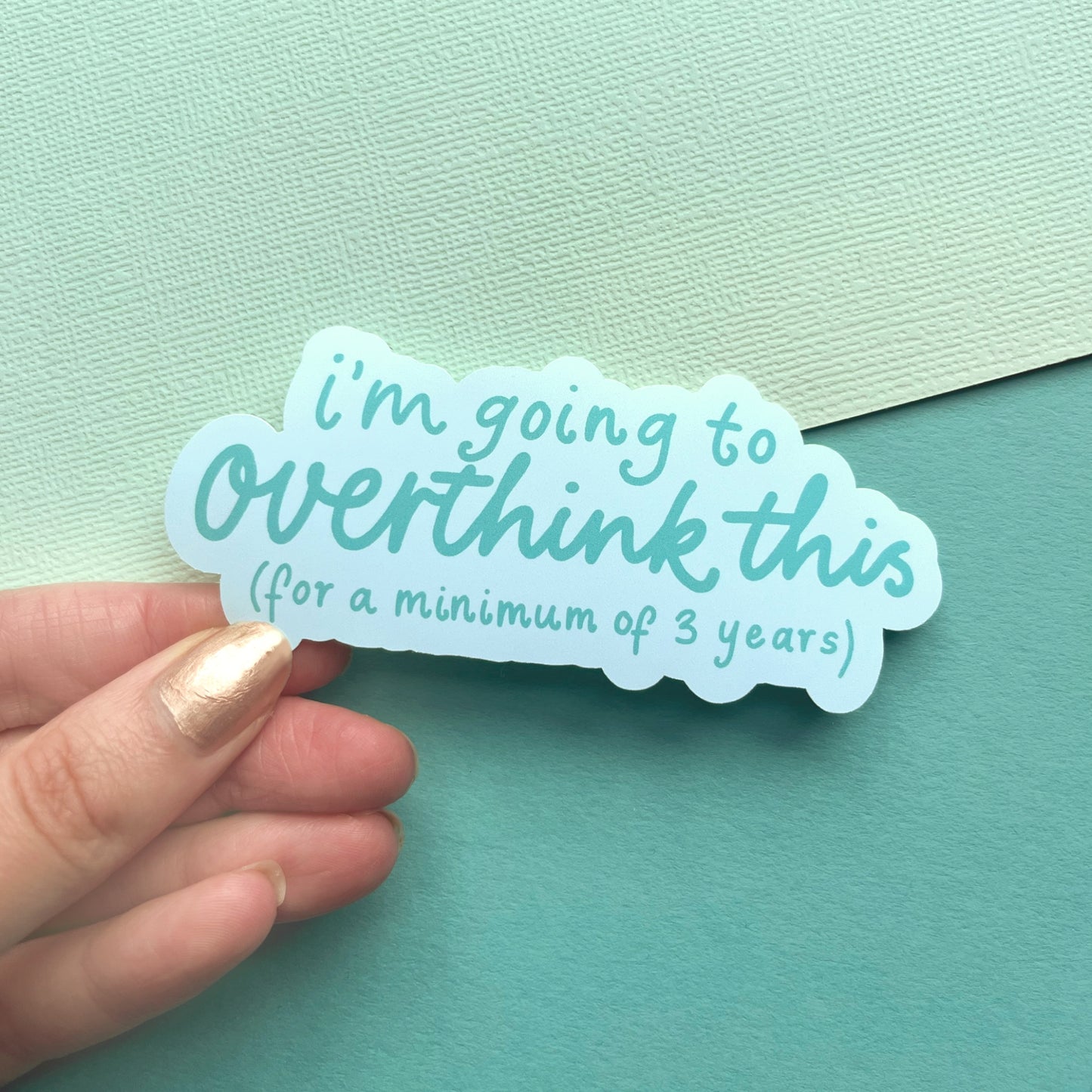 Close-up of overthinking quote sticker with matte finish