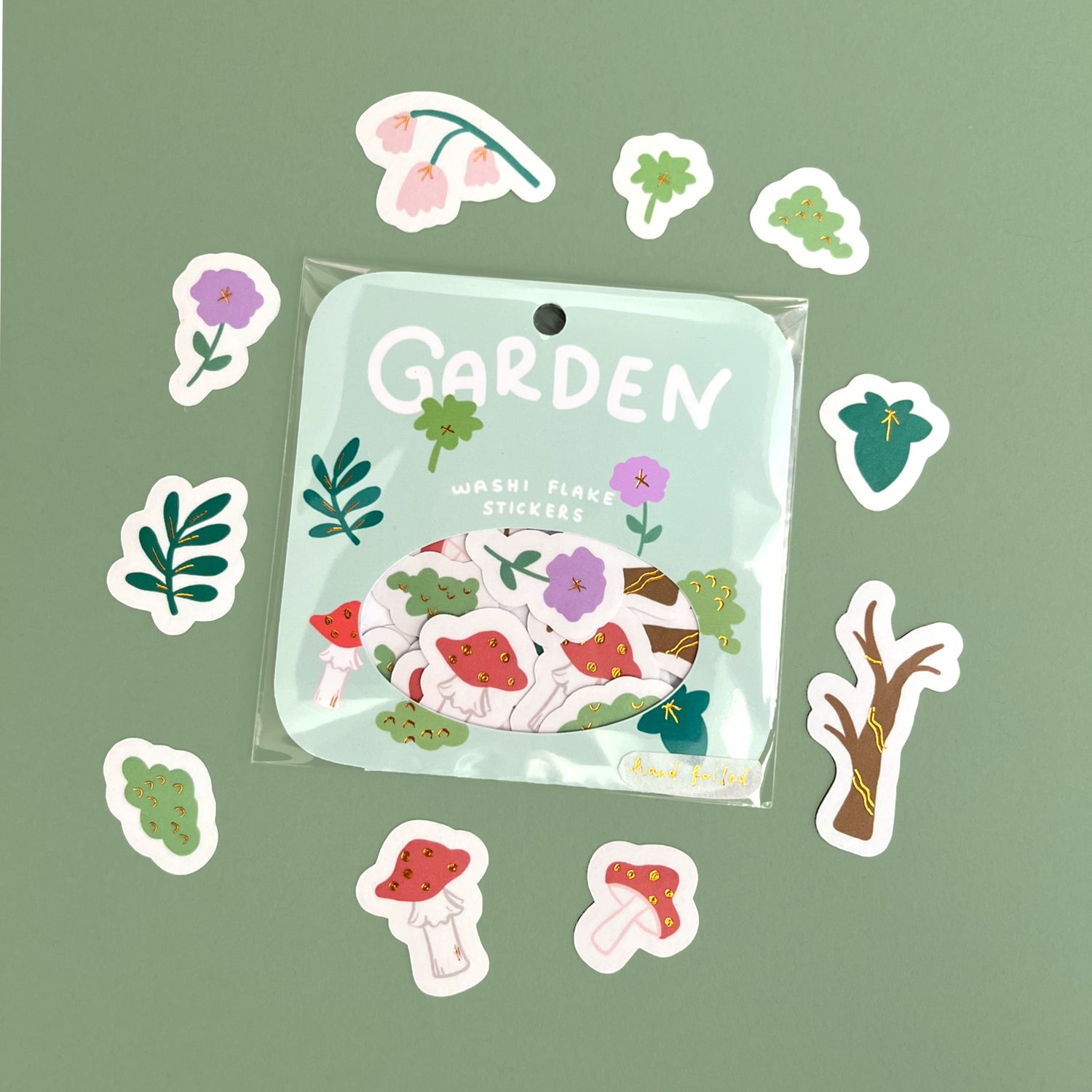 Hand-foiled gold foil washi flake sticker pack featuring whimsical enchanted garden illustrations