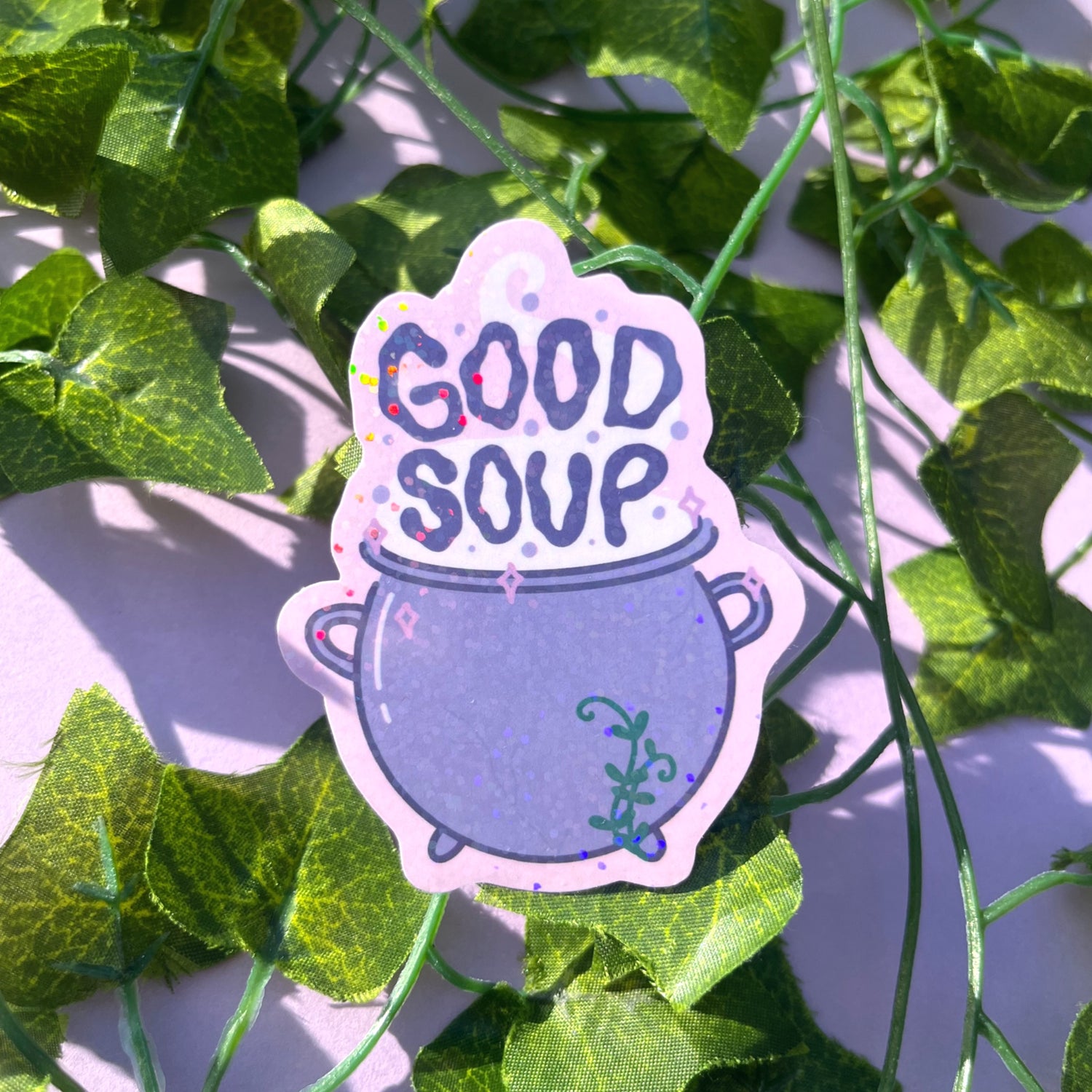 Magic cauldron holographic vinyl sticker with witchy aesthetic