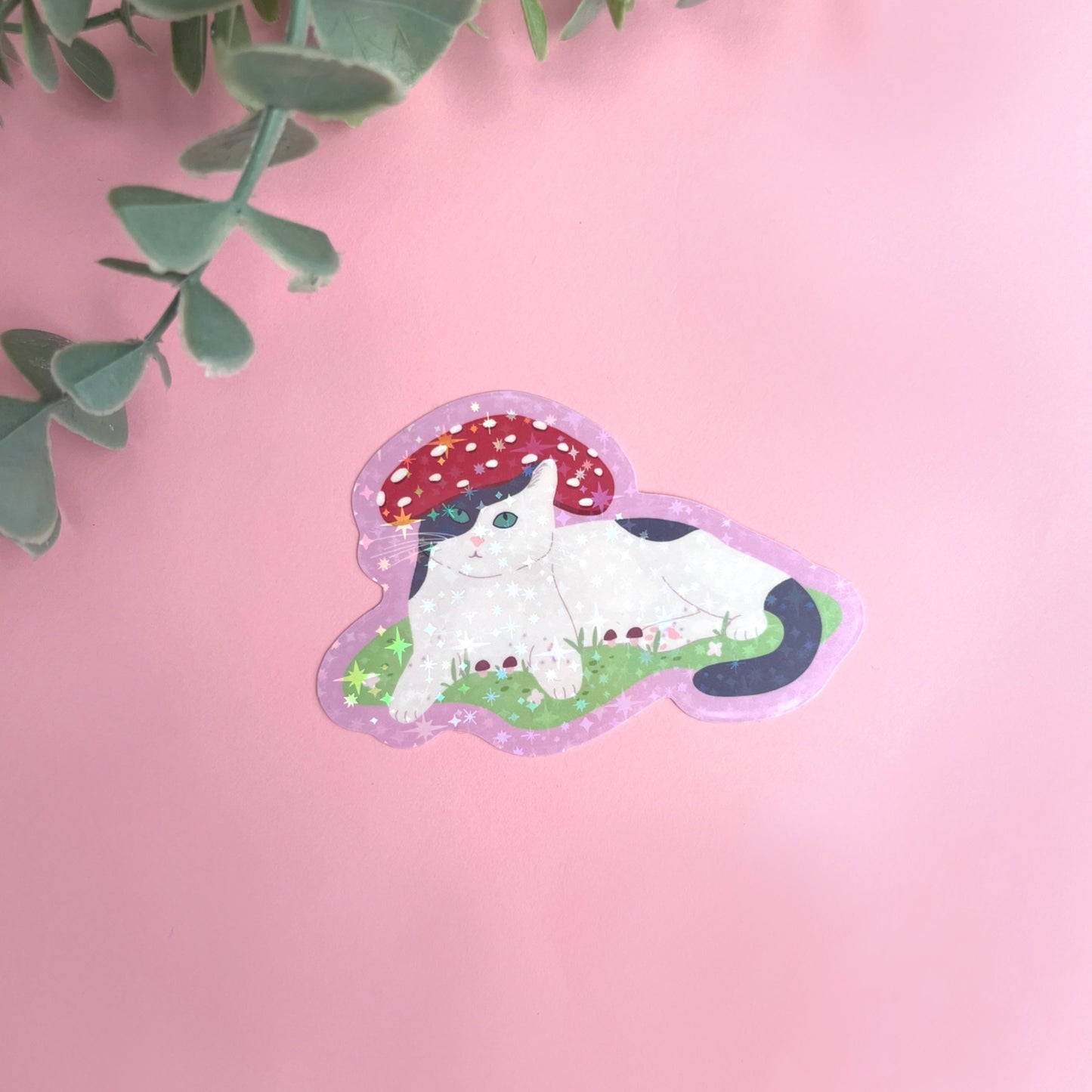 Holographic vinyl sticker featuring a cute fantasy cat wearing a mushroom hat