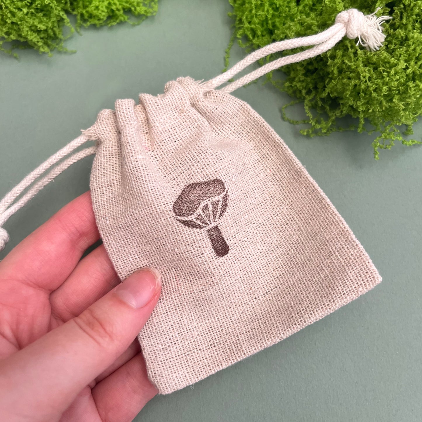 Fantasy mushroom drawstring storage pouch with woodland-inspired illustration