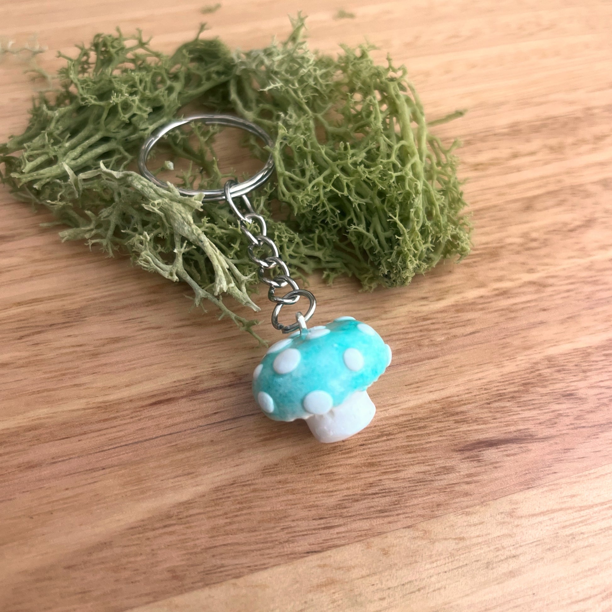 Green polymer clay mushroom keychain – whimsical handmade mushroom charm for keys or bags