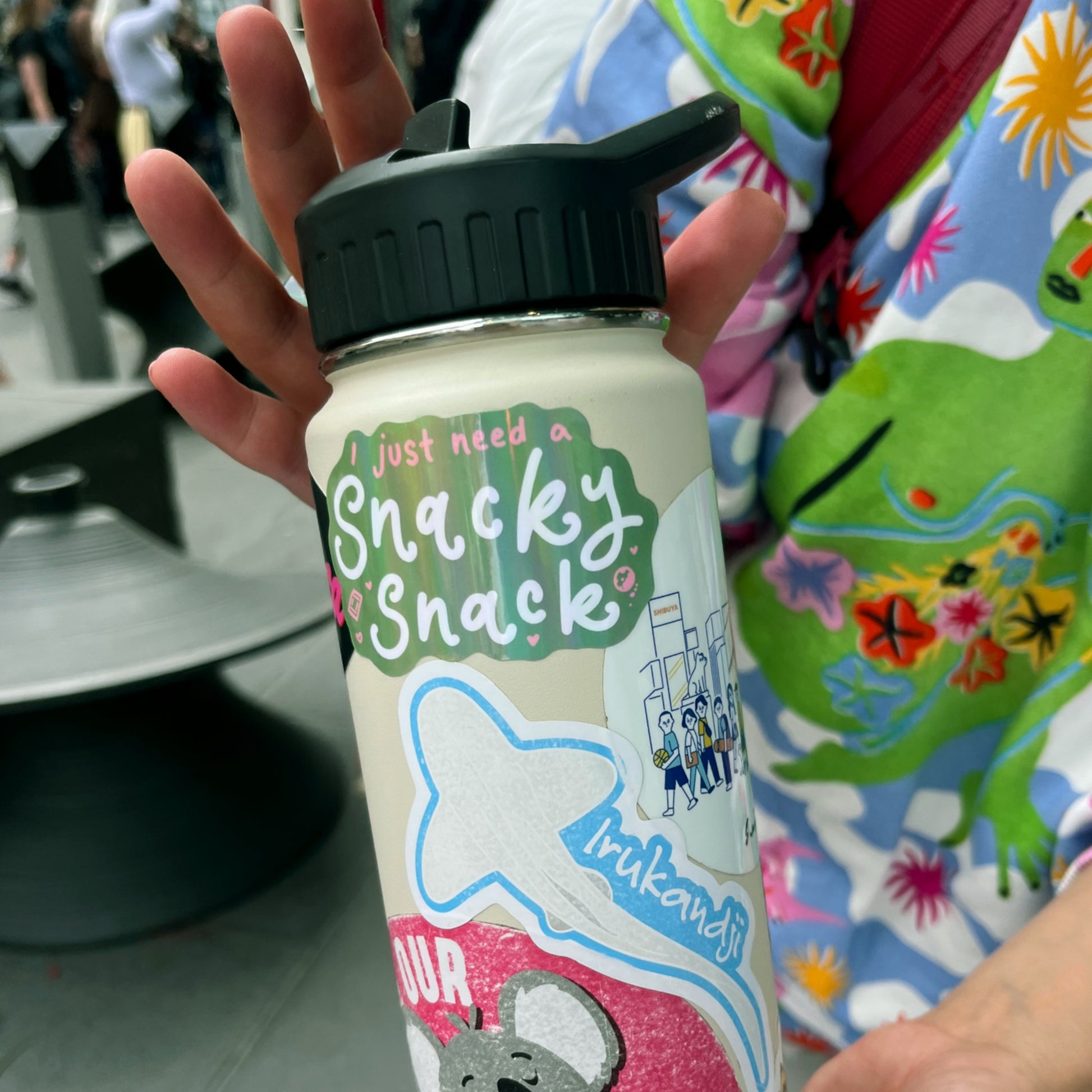 Cute food holographic sticker on a water bottle for snack lovers