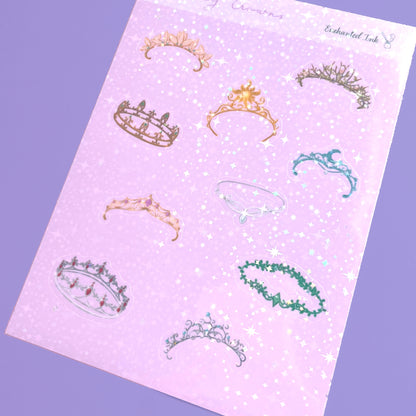 Whimsical holographic sticker sheet featuring fantasy crowns inspired by enchanted kingdoms